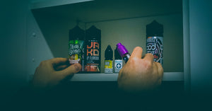 A photo showing E-liquids being stored in a cupboard.