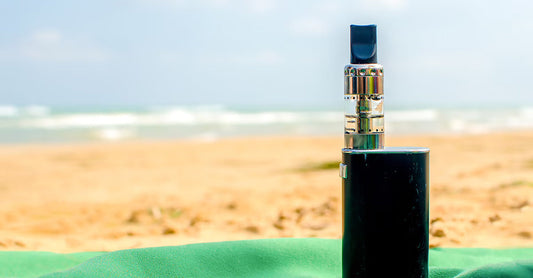 A picture of a vape on a beach