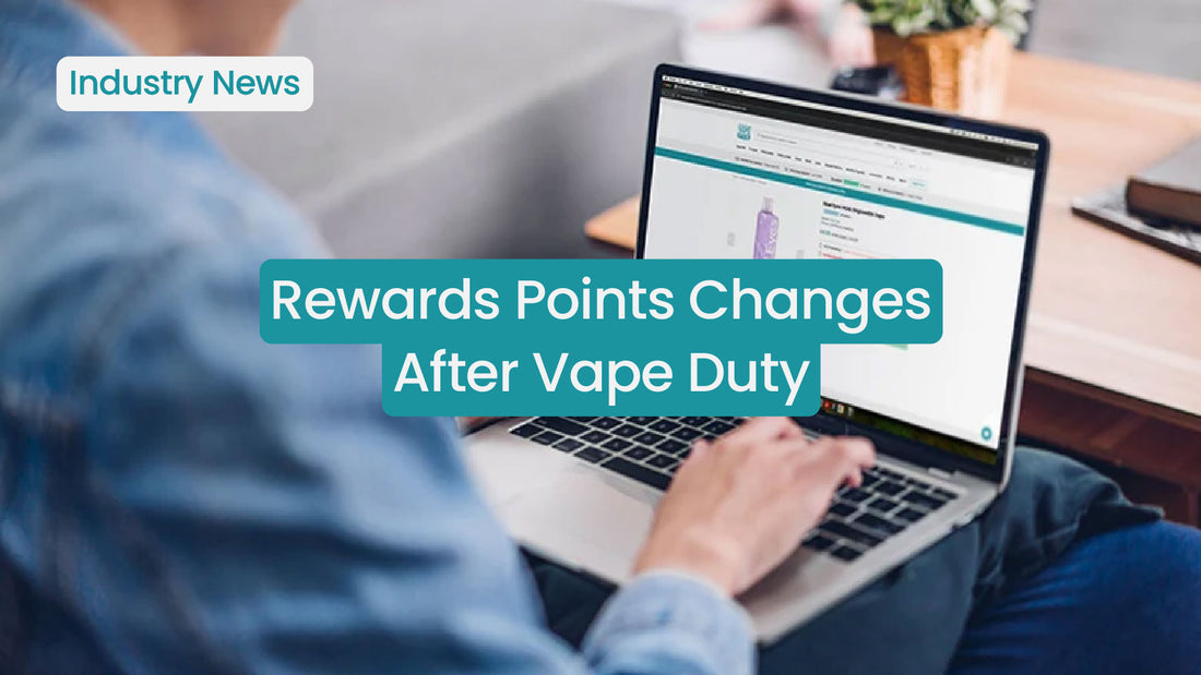 Person using a laptop with text about rewards points changes after vape duty.