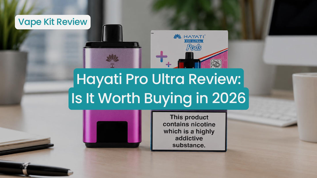 Hayati Pro Ultra vape kit review with product packaging on a table.